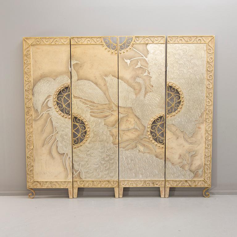 A 21st century metal and wood folding screen.