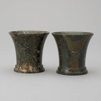 A pair of Swedish green marble beakers.