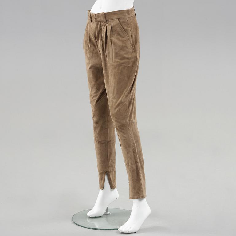 A pair of green suede pants by Ralph Lauren.