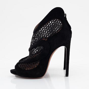 Alaïa, a pair of black suede and net sandals, size 37.