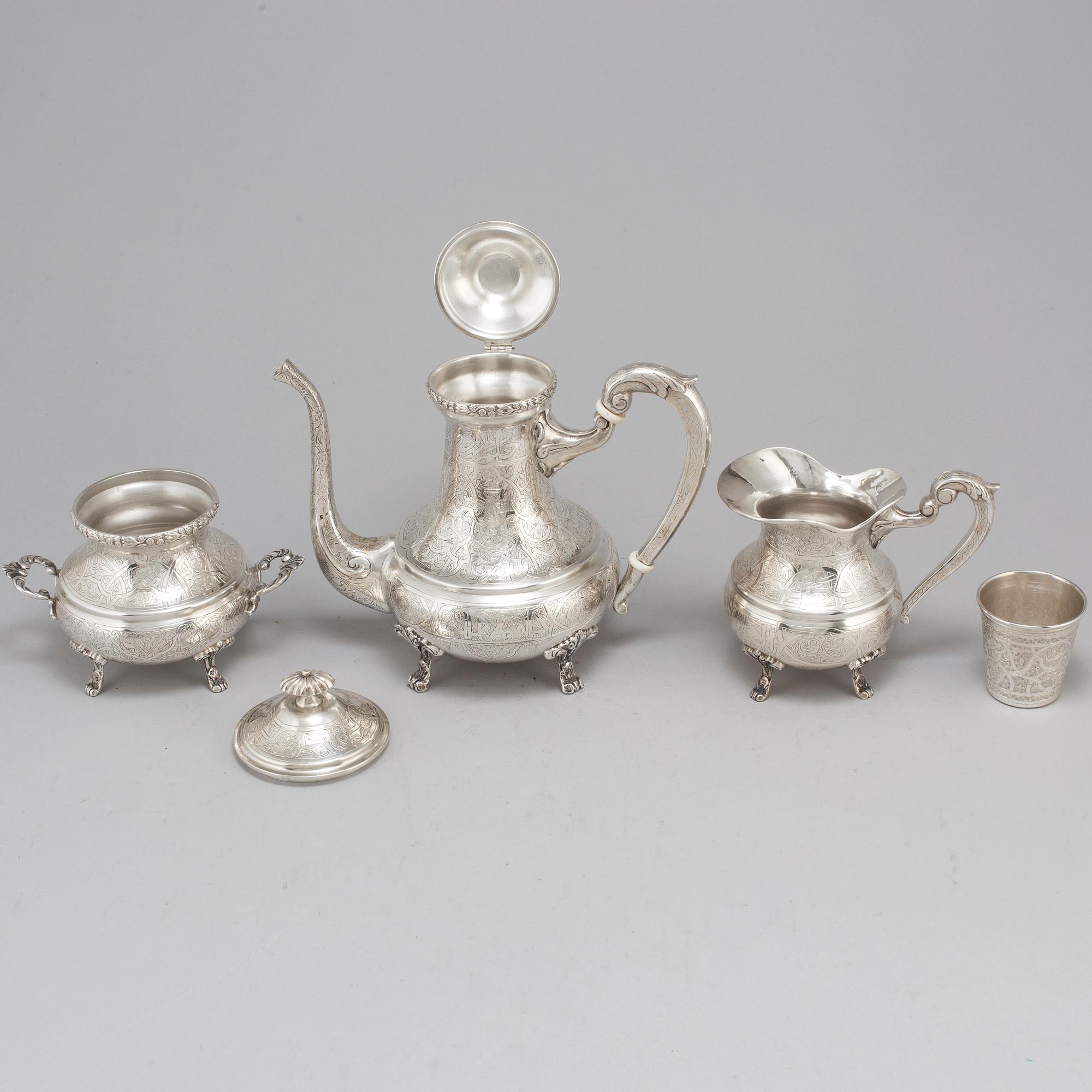 An Egyptian 20th century silver 5 piece tea-set, mark of Kairo 1940's.