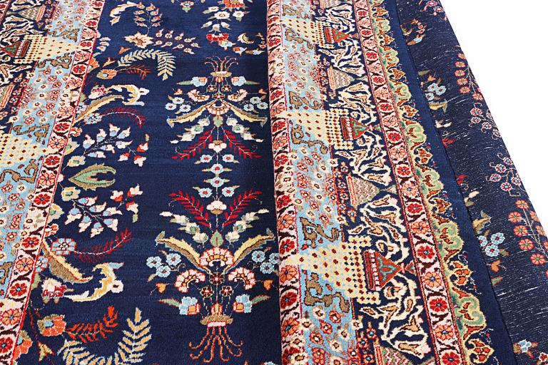 A Kashmar carpet, c. 356 x 260 cm.