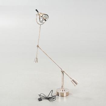 An "EB27" desk lamp, designed by  Edouard-Wilfrid Buquet for Tecnolumen, made around year 2000.