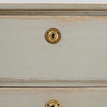 A painted chest of drawers, 19th century.