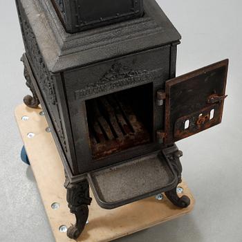 Kamin, gjutjärn, 1900-talets första hälft.