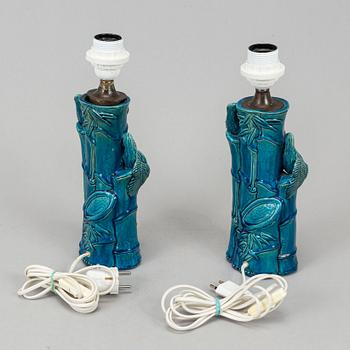 A pair of Chinese blue glazed porcelain table lamps/vases, early 20th century.
