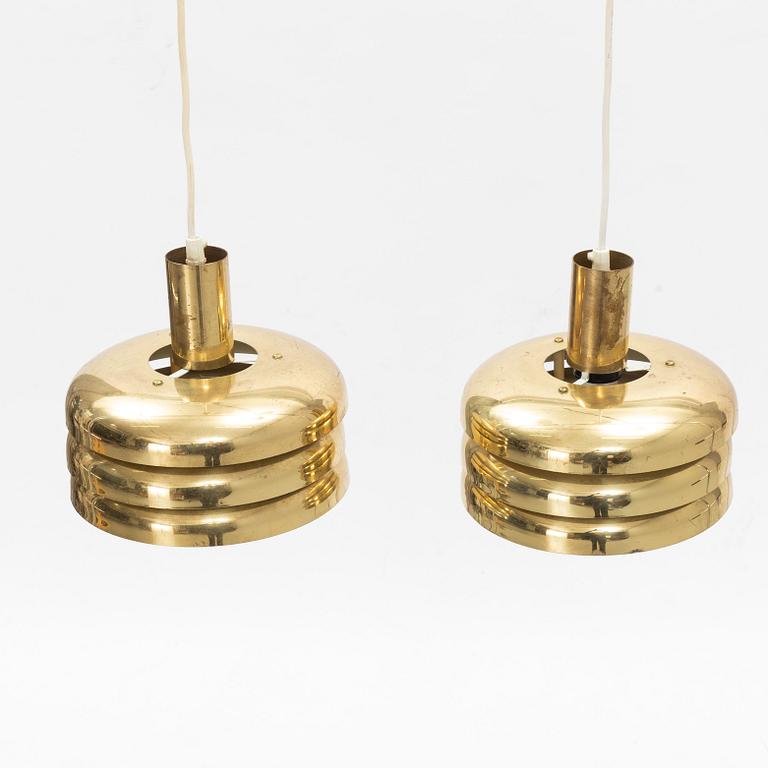 Hans-Agne Jakobsson, a pair of brass model 'T 724/M' ceiling lights, Markaryd.