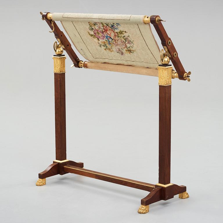 A French Empire early 19th century sewing stand.