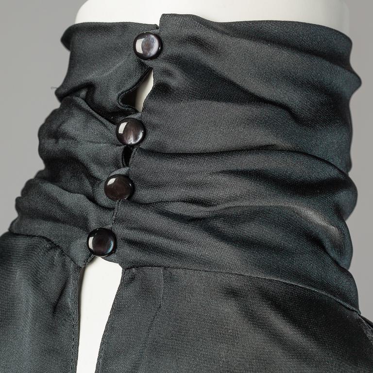 Shirt and top by Ralph Laurent.