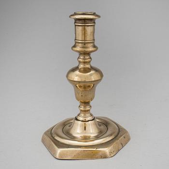 A BRONZE BAROQUE CANDLESTICK, 17th century.