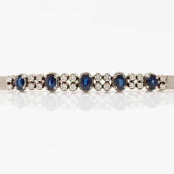 Bracelet, 18K white gold with sapphires and brilliant-cut diamonds.