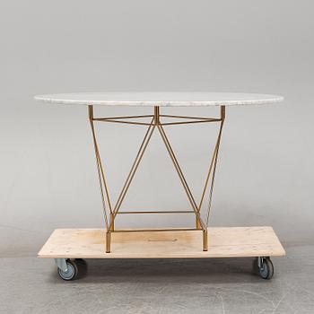 A 'Spider' dining table by Andreas Hansen for Eilersen.