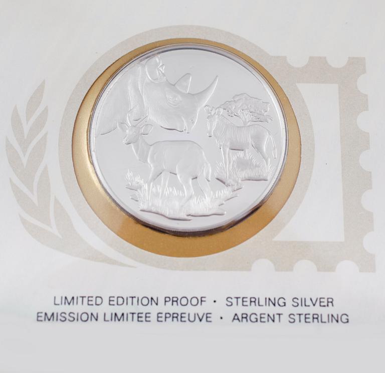 SAMLARMYNT, 36 st, sterlingsilver. Total vikt ca 1080 g.