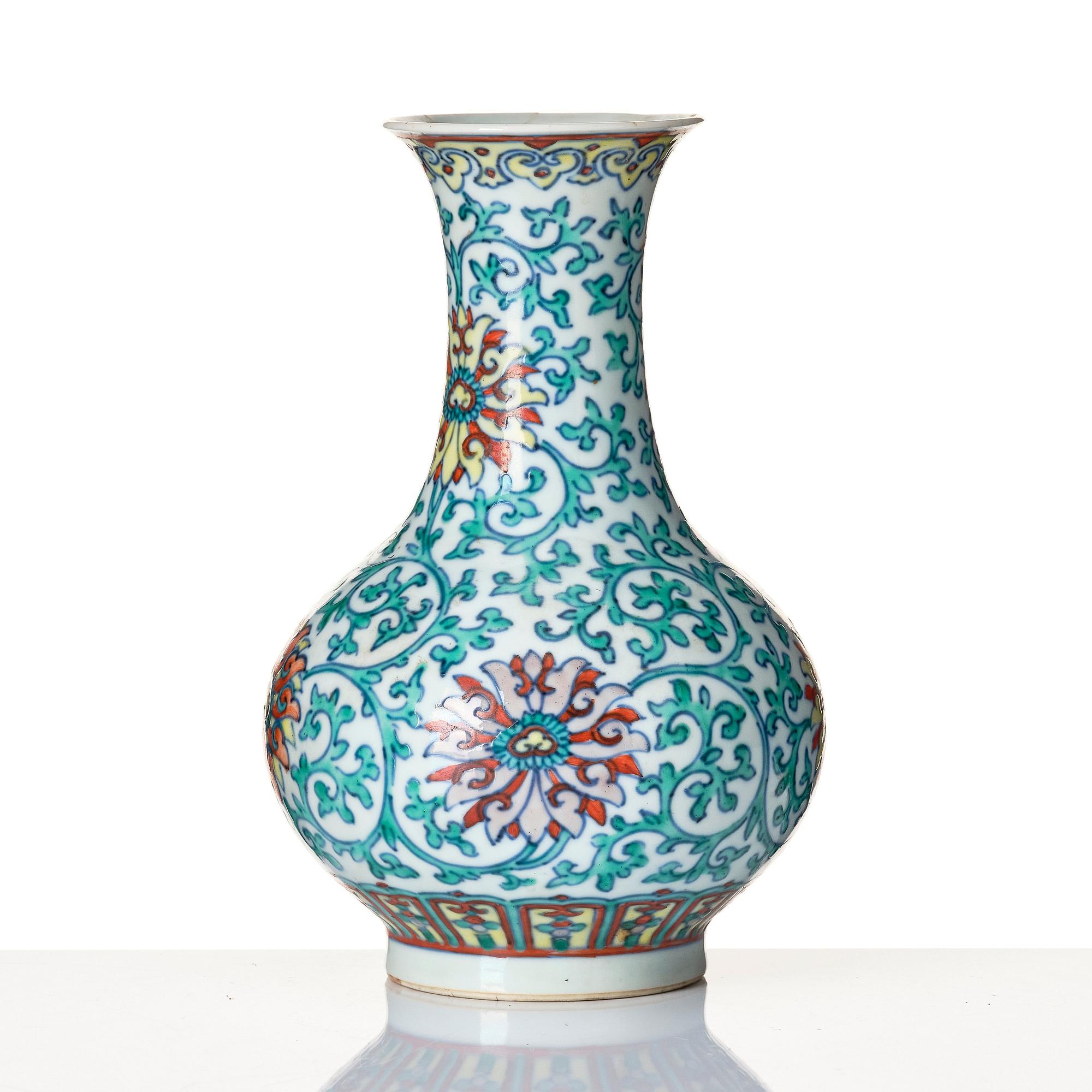 A doucai 'lotus' vase, Qing dynasty with Qianlong seal mark and of the period.