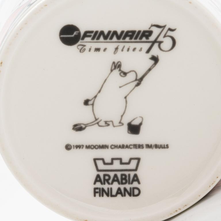 A Moomin Finnair 75 Anniversary mug, vitro porcelain, Moomin Characters, Arabia, Finland 1998.