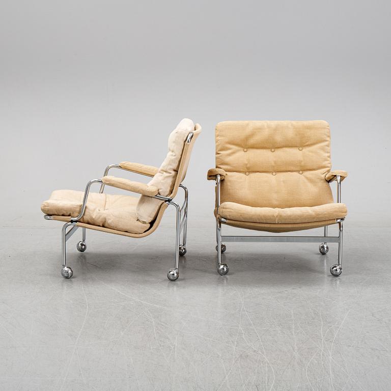 Bruno Mathsson, a pair of easy chairs and a coffee table, 'Karin', Dux, second half of the 20th Century.