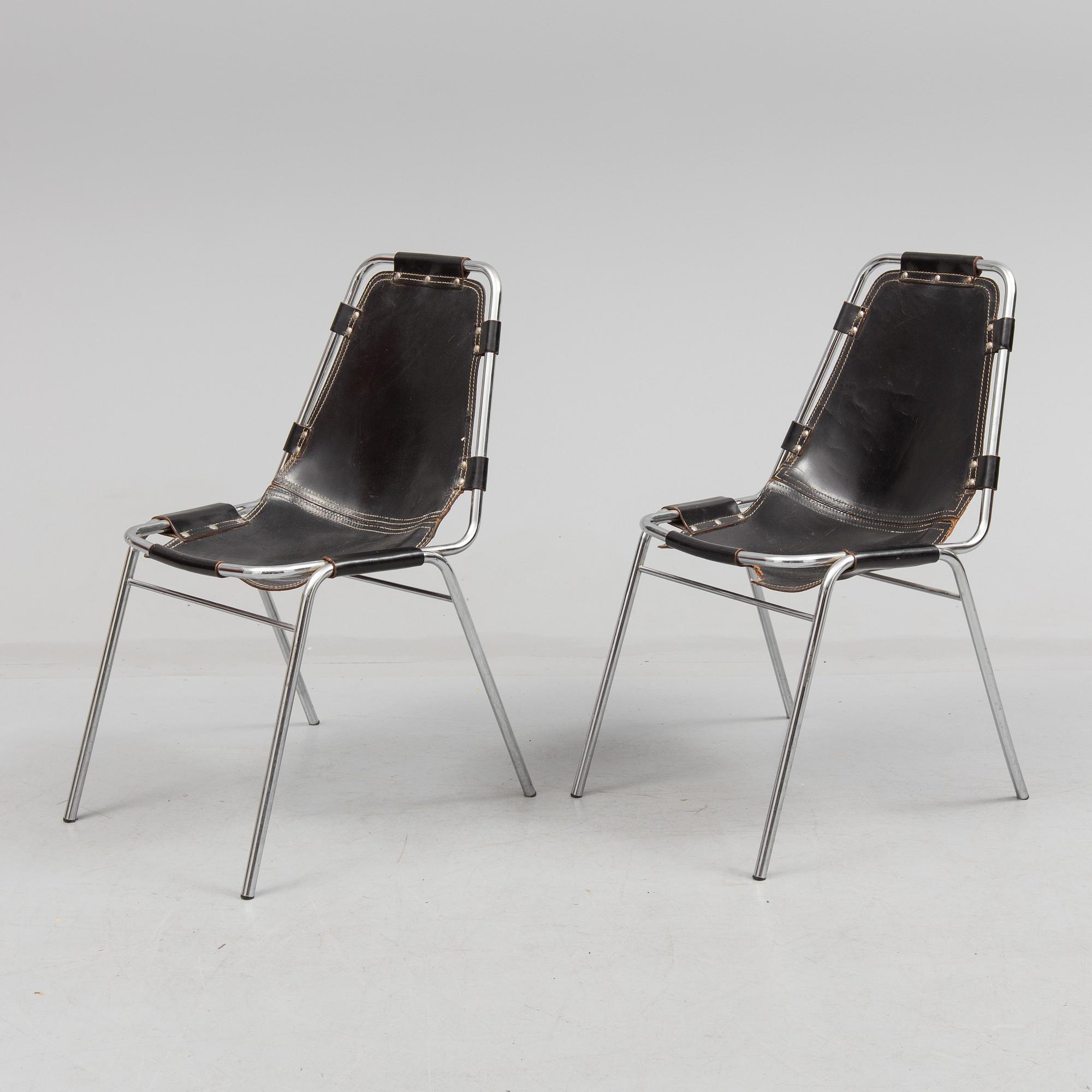 CHARLOTTE PERRIAND, a pair of "Les Arcs" chairs from the 1970's.