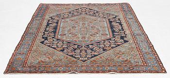 A carpet, semi-antique Hamadan, c. 199 x 128 cm.