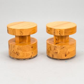 A pair of Finnish pinewood stools/ sidetables, late 20th century.