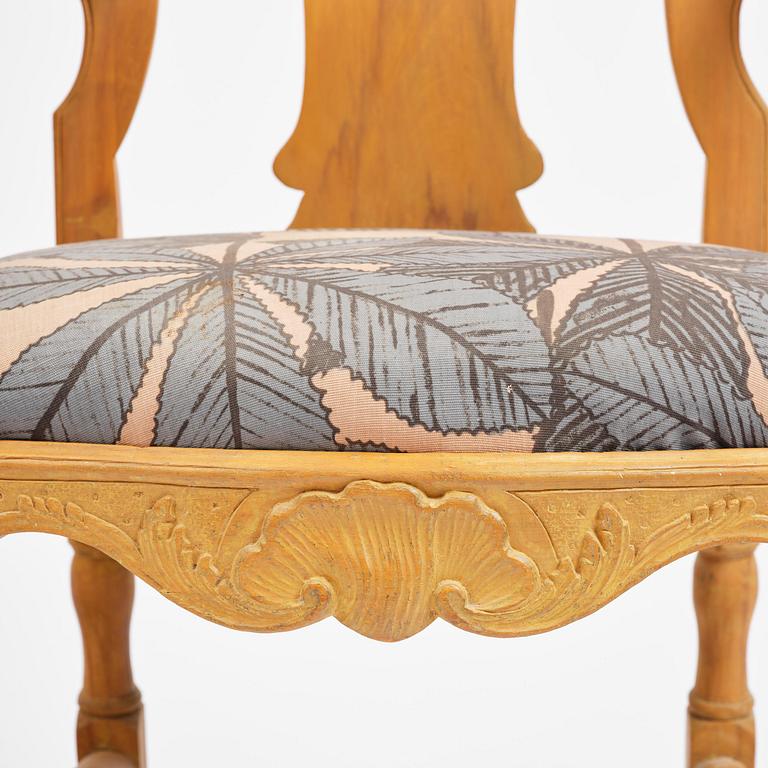 A pair of rococo open-back armchairs, Stockholm, later part 18th century.