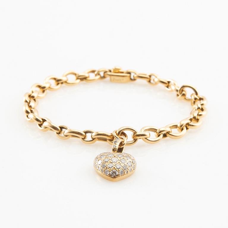 Cartier, Armband av 18K guld med runda briljantslipade diamanter.