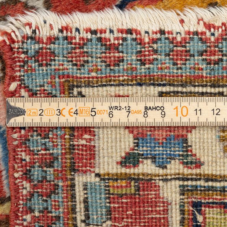 An antique Tabriz carpet, c. 365 x 280 cm.