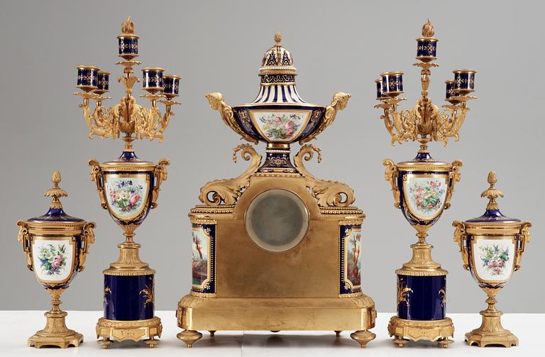 A French 'Sèvres' five piece gilt-bronze garniture, 19th Century, Signed P.D. Boucher.