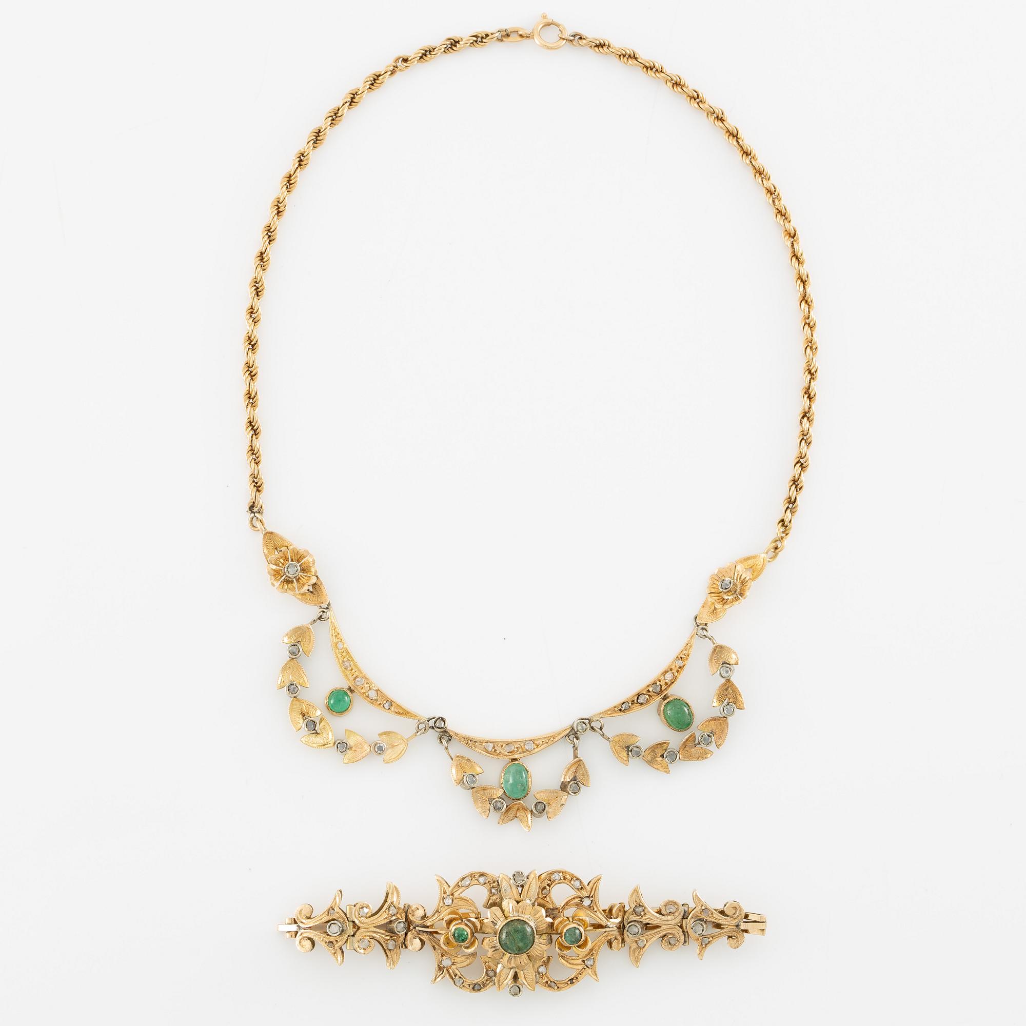 Necklace and bracelet in with floral motif set with cabochon-cut emeralds and rose-cut diamonds.