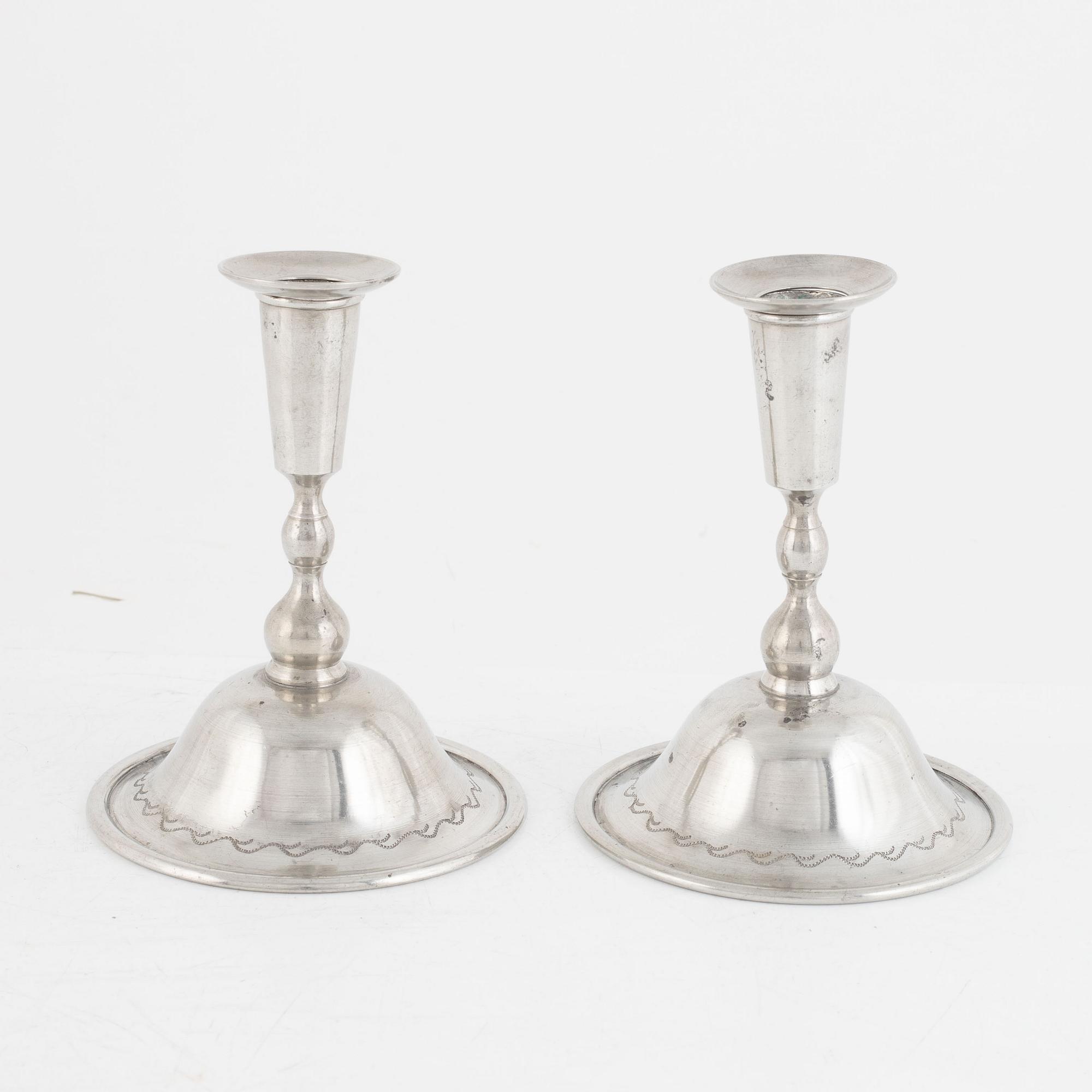 Firma Svenskt Tenn, a pair of pewter candlesticks model "76", Stockholm 1925.