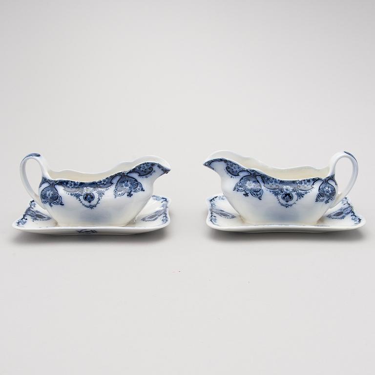 A 68-piece set of 'Empire' flow blue dinnerware, Soho Pottery Limited, Cobridge, England first half of the 20th Century.