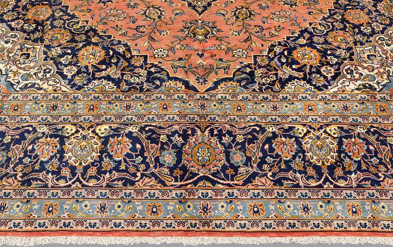A Keshan older carpet, 430 x 305 cm.