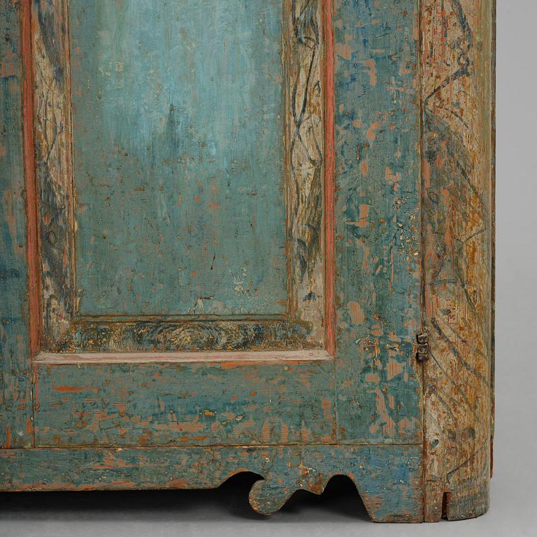 A Swedish polychrome-painted rococo cabinet, late 18th century.