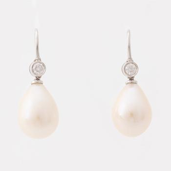 Cultured pearl and brilliant cut diamond earrings.