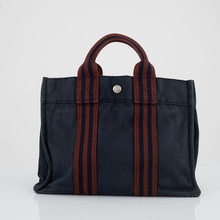 Hermès, "Fourre tout PM" bag and toiletry bag.