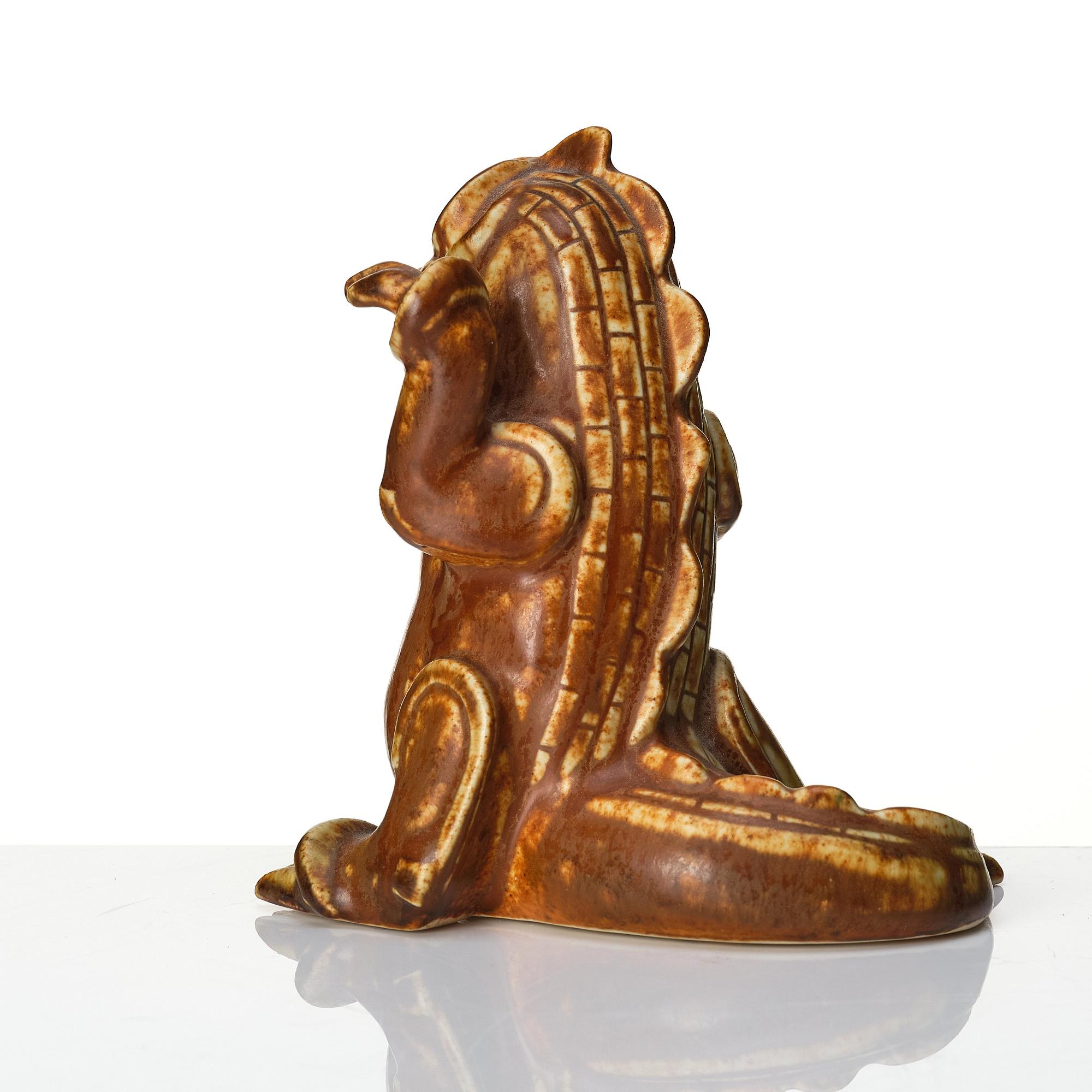 Wilhelm Kåge, a stoneware sculpture of a dragon puppy, Gustavaberg, Sweden 1940-50s.