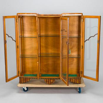 A 1940s display cabinet, England.