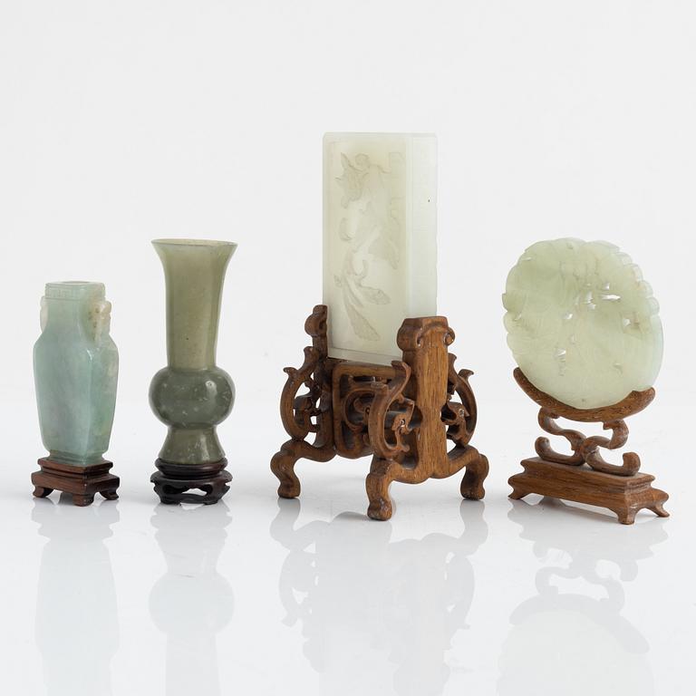 A group of four Chinese sculptured nephrite objects, 20th Century.