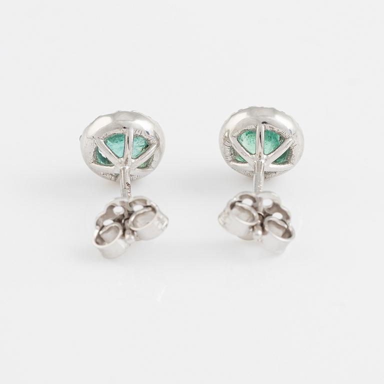 Emerald and brilliant cut diamond earrings.