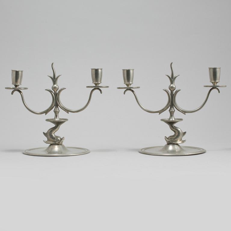 LJUSSTAKAR, ett par, tenn, Firma Svenskt Tenn, Stockholm, 1927.