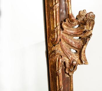 A 20th century mirror in baroque style.