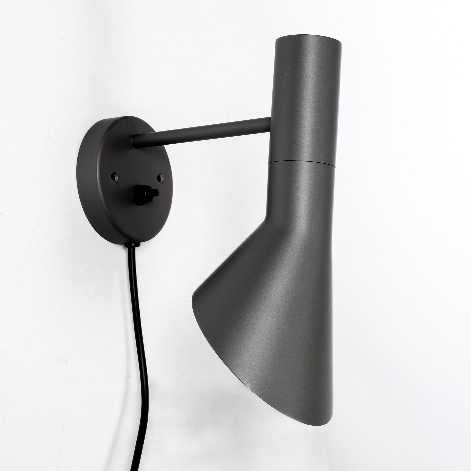 Arne Jacobsen, An 'AJ' wall lamp, Louis Poulsen. 21st century.