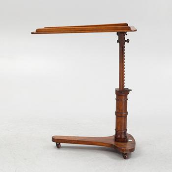 A reading table, J. Carter London, England, circa 1900.