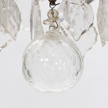 A six-light rococo-style chandelier, later part of the 20th century.