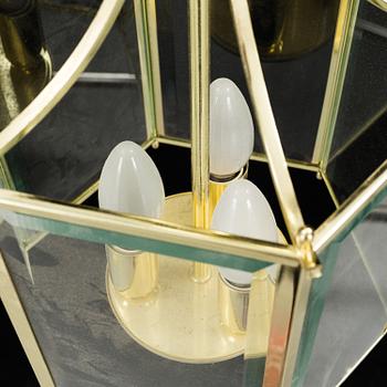 A 20th century brass hexagon hall ceiling lantern for three lights.