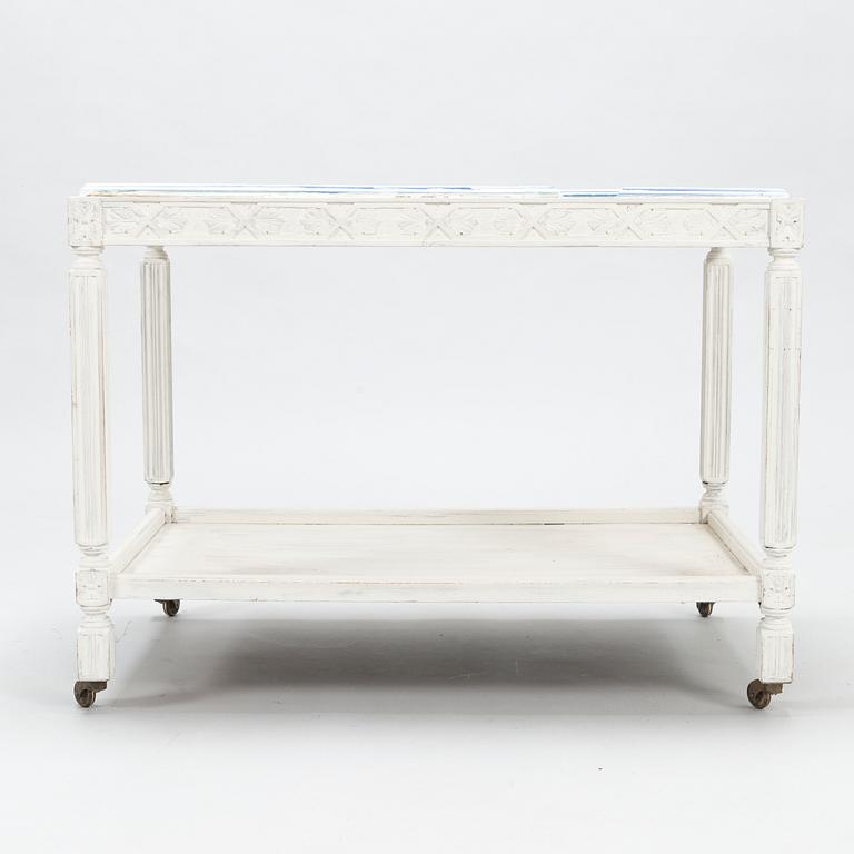 BIRGER KAIPIAINEN, A tray table/tea trolley signed Kaipiainen 1942, Arabia.