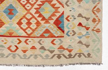 A Kilim carpet. ca 295 x 208 cm.