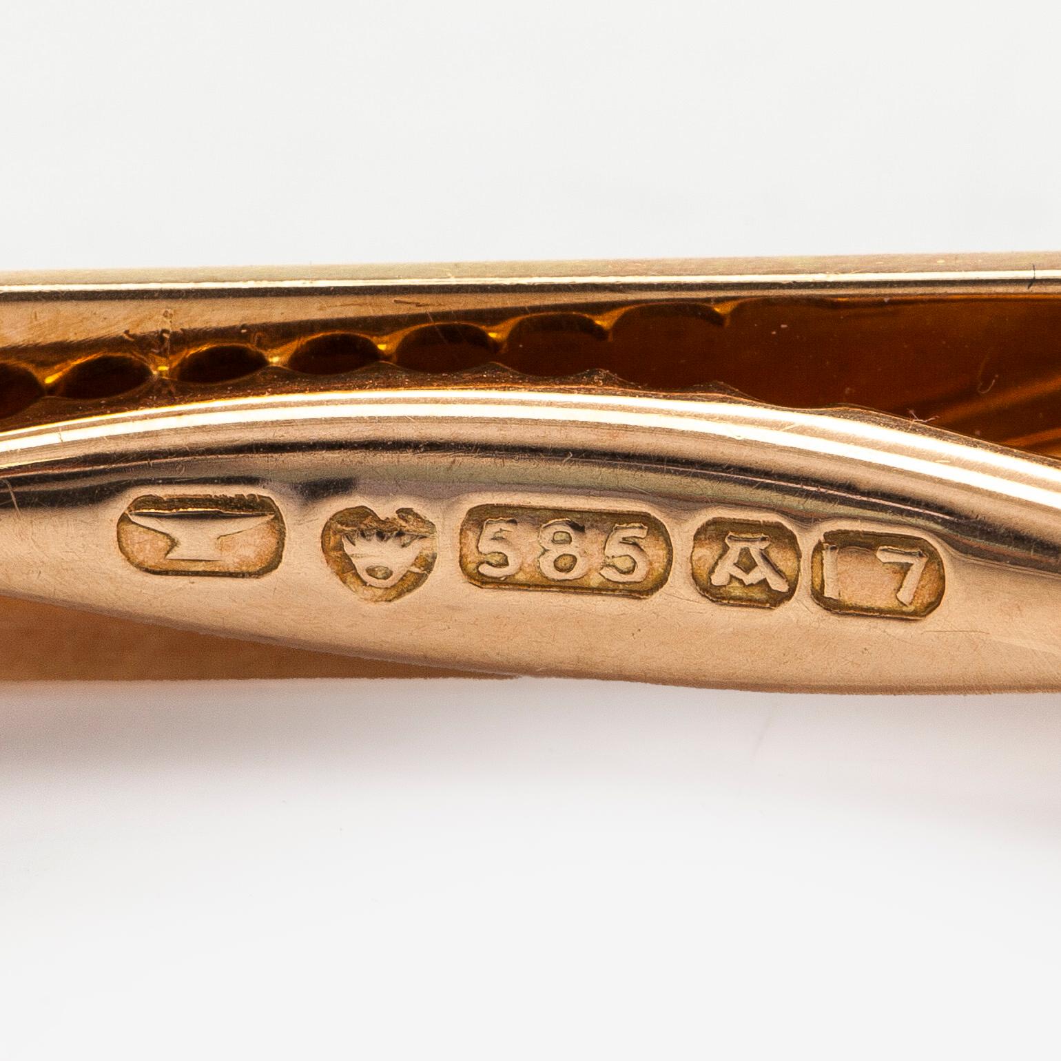 Elis Kauppi, A 14K gold tie pin with hematites. Kupittaan Kulta Turku 1962.