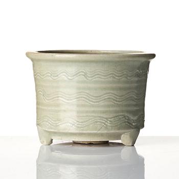 A celadon tripod censer, 16/17th century.