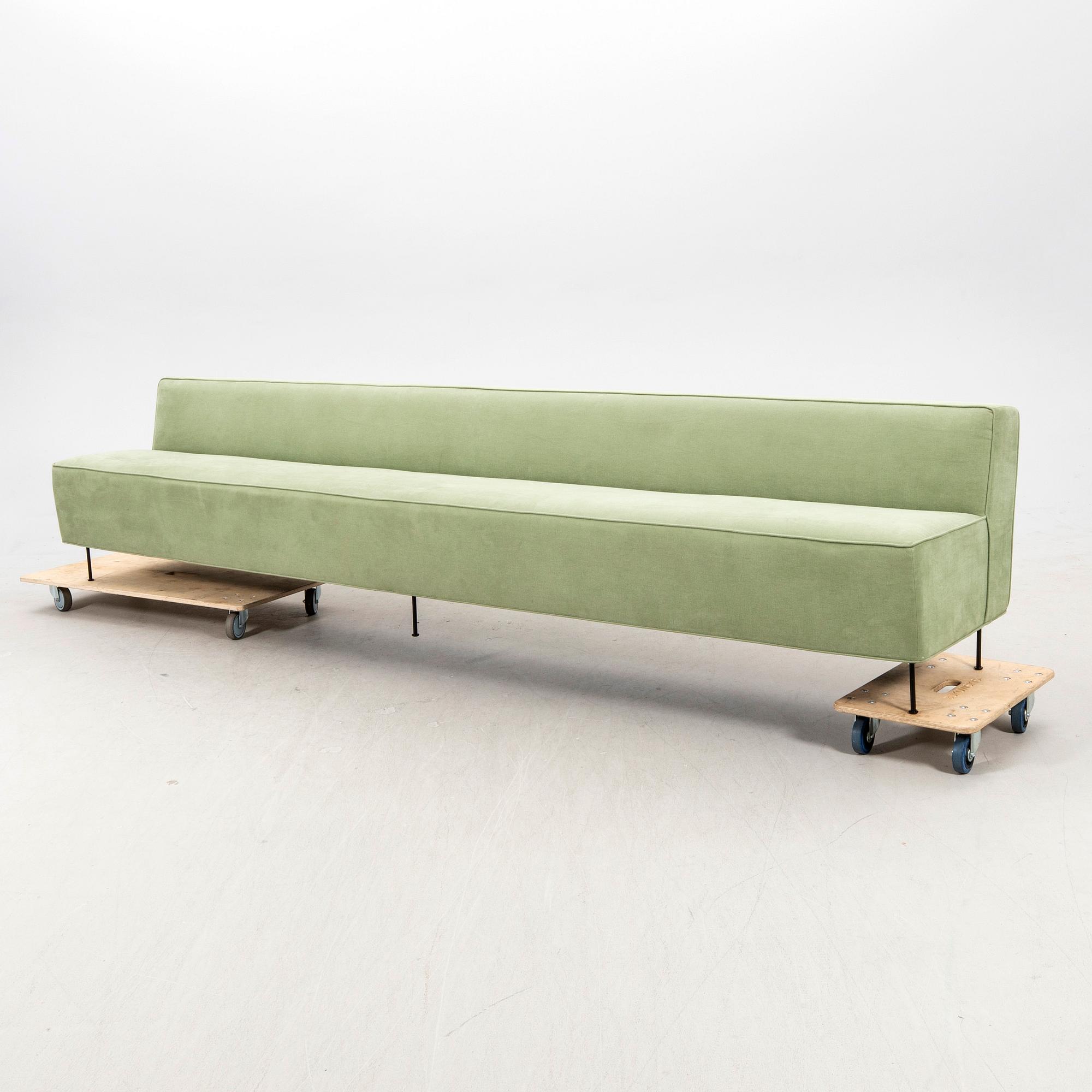 A sofa Modern Line' by Greta Magnusson Grossman, produced by Gubi, contemporary.