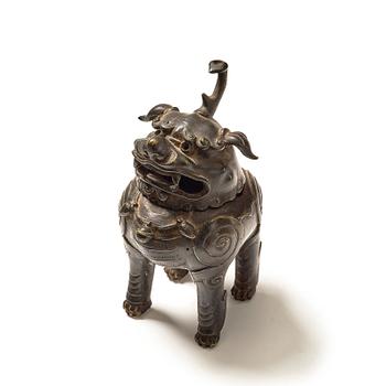 A bronze censer in the shape of a buddhist lion, Ming dynasty (1368-1644).